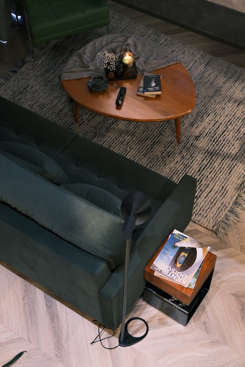 Magazine placed beside a sculptural lounge setting